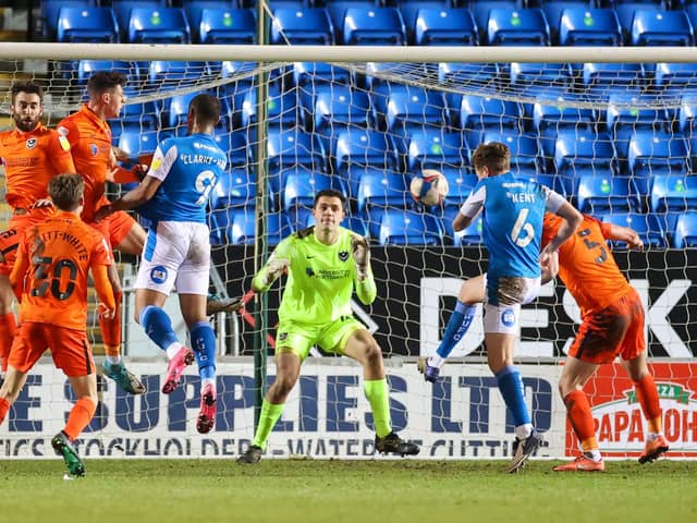 Frankie Kent makes it 3-0 to hosts Peterborough on the stroke of half-time as Pompey are eliminated from the Papa John's Trophy. Picture: Nigel Keene/ProSportsImages