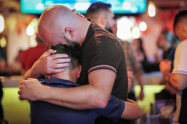 Father and son at full-time. Fans watch Netherlands v England, UEFA Euros 2024 semi-final played in Dortmund, at Village Hotel, Lakeshore Drive, Cosham
Picture: Chris Moorhouse (100724-107)