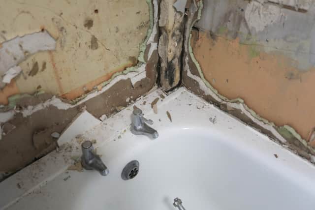 Damage around the bathtub. Picture: Sam Stephenson