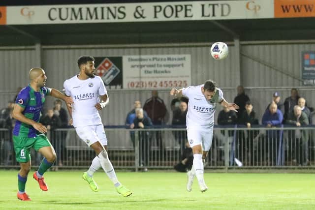 Andy Drury heads Hawks' fourth goal during their 6-0 home win over Dorking. The Surrey club had the worst defensive record of any of the six teams in the National League South play-offs. Photo by Dave Haines/Portsmouth News