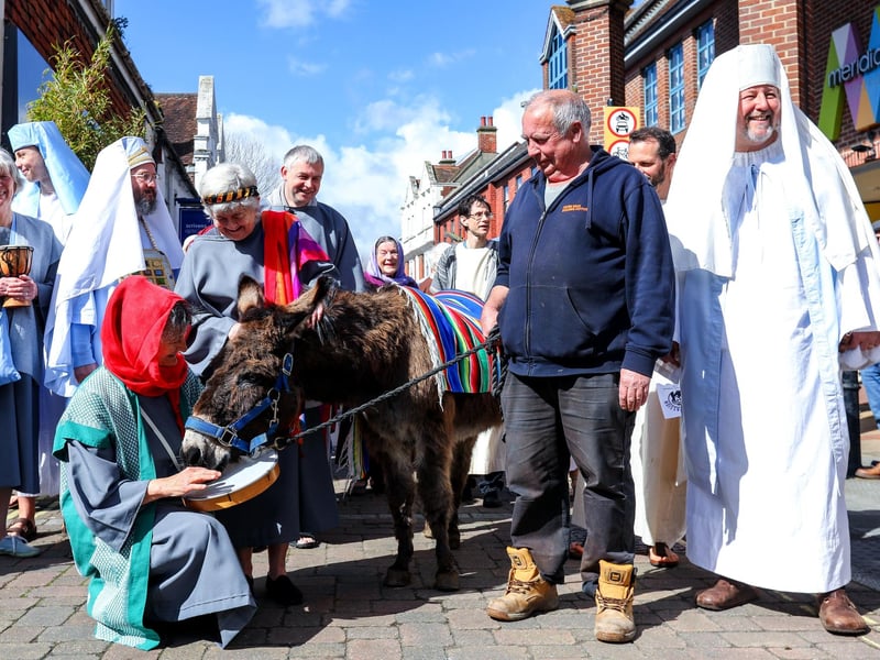 The arrival of the donkey at the head of the procession. The Havant Passion, West Street, Havant
Picture: Chris Moorhouse (300324--2)