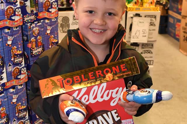 Happy shopper Ollie Hold, six. Picture by Paul Jacobs/pictureexclusive.com