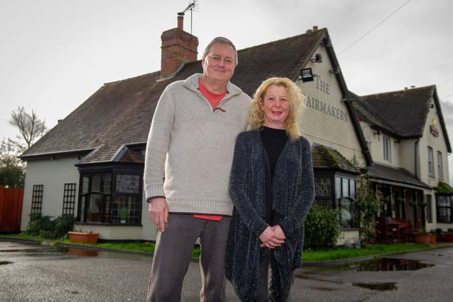 The Chairmakers in Apless Lane,  Denmead, has a good sized beer garden. 

Pictured: Angus Reid and his wife Sherry Reid at The Chairmakers on 3 February 2021.

Picture: Habibur Rahman