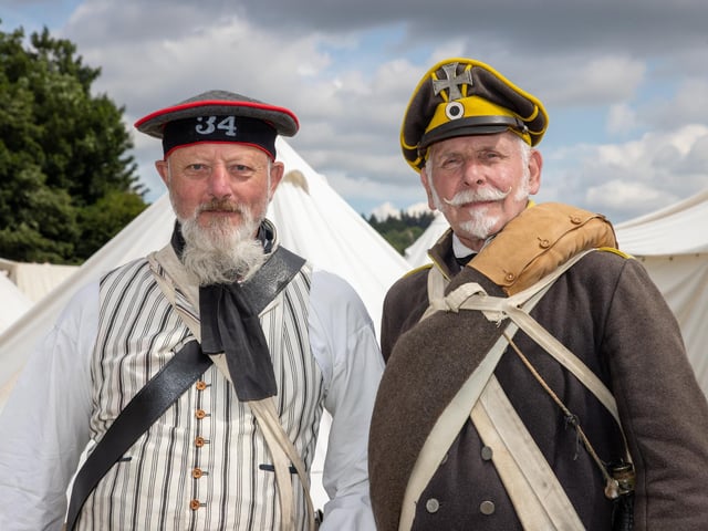 Stansted Park opened its doors for its Summer Festival this weekend, with re-enactments, vintage vehicles, archery, horse displays and lots of fun for the family.
Pictured - Jerry Hill (Prussian Artillery) and Andy Smith (Prussian Infantry)
Photos by Alex Shute