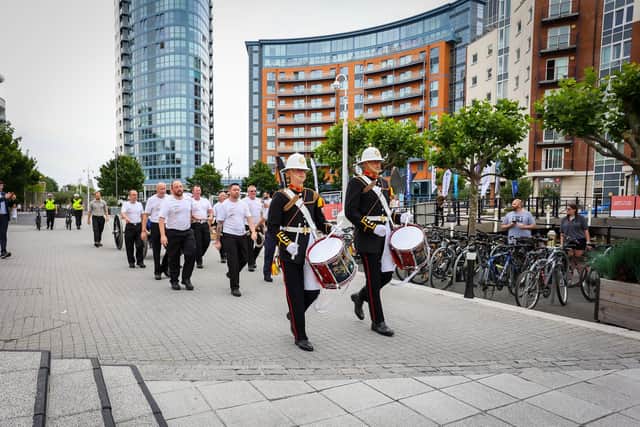 At 4pm on Saturday afternoon, a Royal Navy Field Gun with a Union flag draped over carried the RNA memorial wreath from HMS Nelson Wardroom to the Falklands Memorial, Sally Port, Old Portsmouth, via Gunwharf Quays. Pictured - The Royal Navy Field Gun was taken through the streets of Old Portsmouth, Via Gunwharf Quays on its way to the Hot Walls. Photos by Alex Shute.