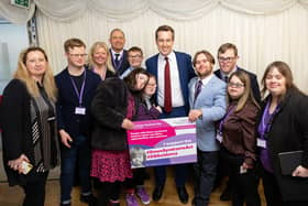 Max, Rachael and Ken with members of PDSA and government Minister Tom Pursglove