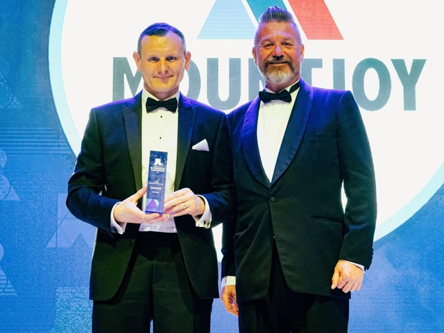 Mark Collins, of Nation Radio, hands the Large Business of the Year award to Mountjoy Ltd's managing director, Simon Ingram.   Picture: Keith Woodland (270321-259)
