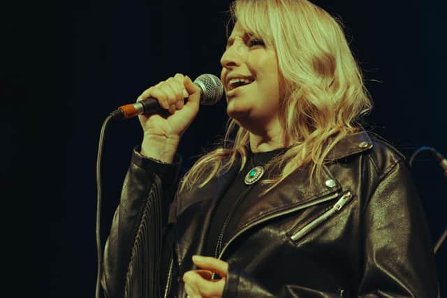 Kate Harding performing live