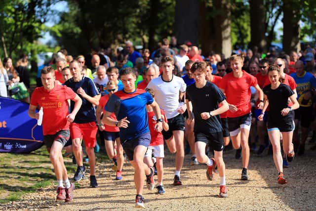 The start of the 450th Havant parkrun. Winner Alfie Moth (blue/red top) is in the cente.
Picture: Chris Moorhouse