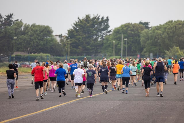 Runners leaving the startline at the Run the Runway event at Solent Airport. 

Picture: Mike Cooter