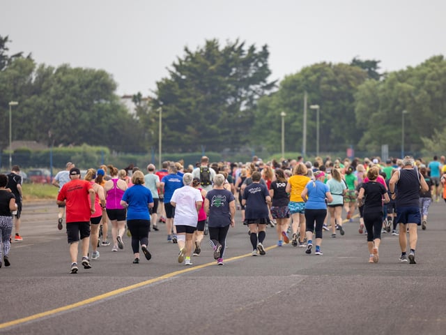 Runners leaving the startline at the Run the Runway event at Solent Airport.
Picture: Mike Cooter