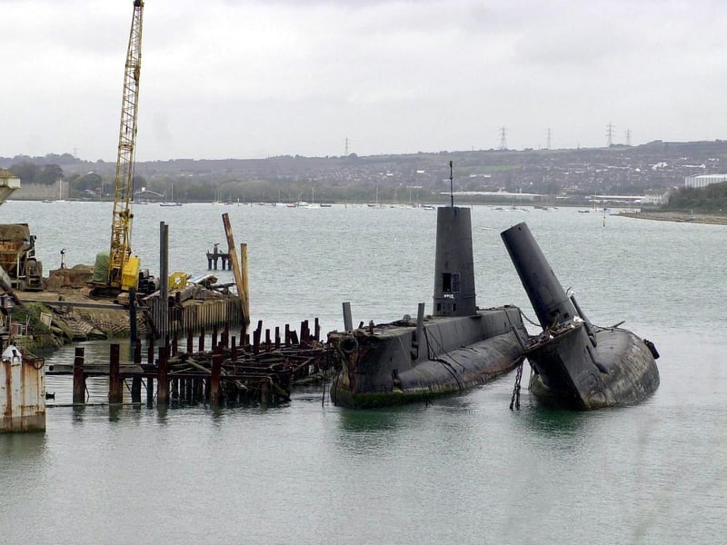 O-Class Submarines two of the boats formerly based at HMS Dolphin, Gosport, now waiting to be cut-up for scrap at Pound's shipbreakers yard at Tipner, Portsmouth.  Picture: Michael Scaddan 006051-0018