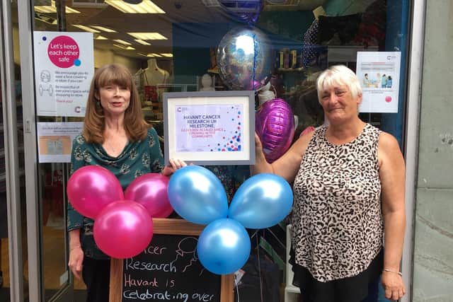 Outside the Havant charity shop, which has just hit its £2 million fundraising milestone