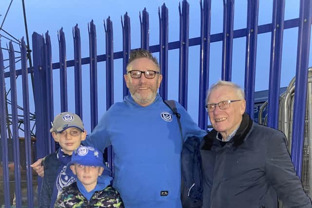 Pompey fans depart from Fratton Park for the Tottenham Hotspur Stadium. Pictured is Lawson Baker, 50, his two sons, Barnaby, 11 and Austin, 8, and their grandad Chris Baker, 80.