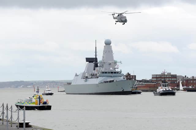 HMS Defender pictured in Portsmouth having returned from the Gulf