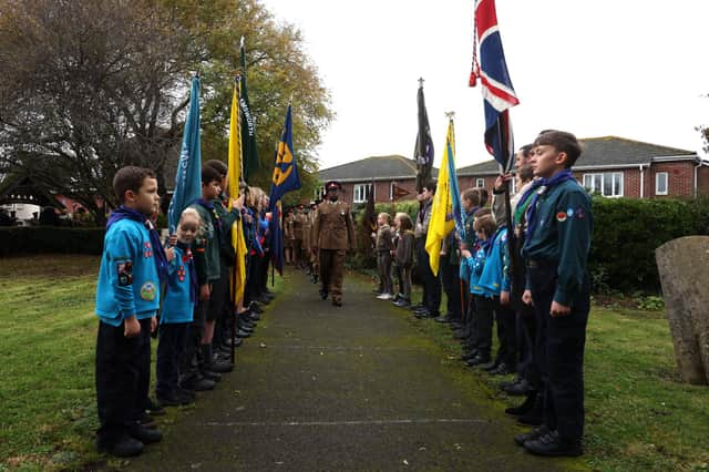 The 16 Regiment Royal Artillery lead the march into the church for a Remembrance service