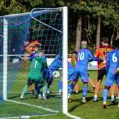 Ryan Wilkins (2) scores Portchester's second goal in their 3-0 Wessex League win at Christchurch. Picture by Daniel Haswell.