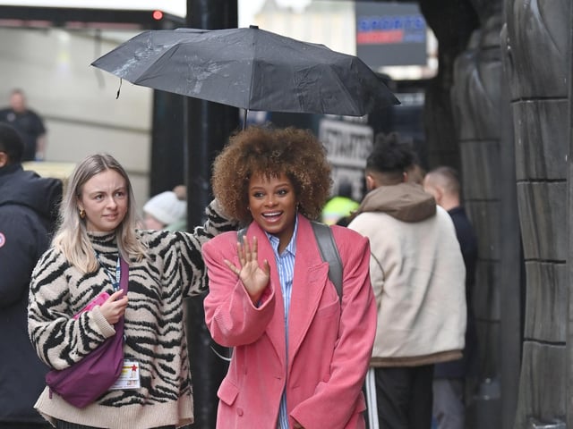 Strictly cast arrive at the Blackpool Tower in the heavy rain