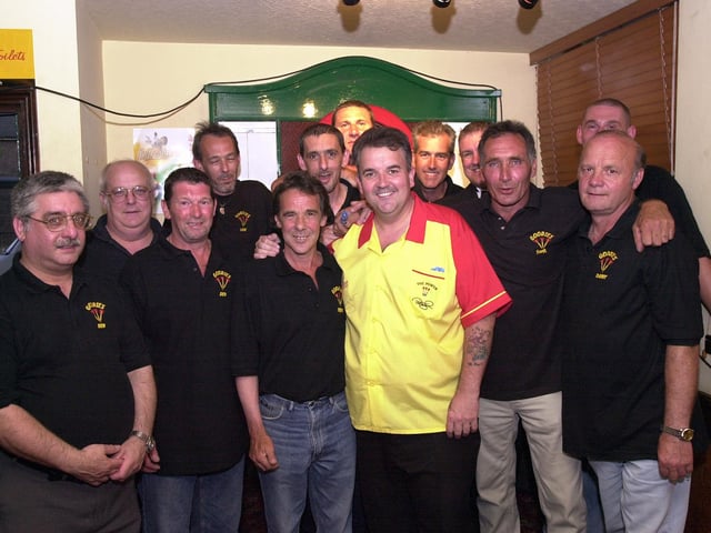 Phil 'The Power' Taylor pictured alongside members of The Goodies team at The Good Companion public house on the Eastern Road in 2003.
