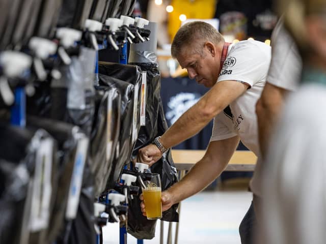 The backstage of the busy bar at the Wickham Charity Beer Festival. 

Picture: Mike Cooter