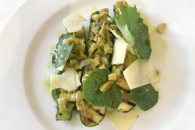 Courgette salad with thyme and green olives. 