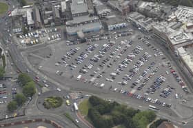 The Market Way car park, and the back of shops at the north end of Commercial that are covered by part of the council's planned compulsory purchase order Picture: Methuselah Tanyanyiwa
