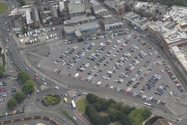 The Market Way car park, and the back of shops at the north end of Commercial that are covered by part of the council's planned compulsory purchase order Picture: Methuselah Tanyanyiwa