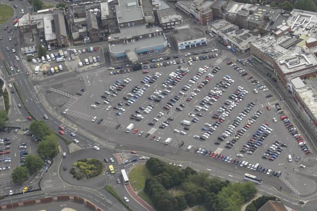 The Market Way car park, and the back of shops at the north end of Commercial that are covered by part of the council's planned compulsory purchase order Picture: Methuselah Tanyanyiwa