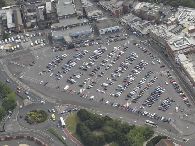 The Market Way car park, and the back of shops at the north end of Commercial that are covered by part of the council's planned compulsory purchase order Picture: Methuselah Tanyanyiwa