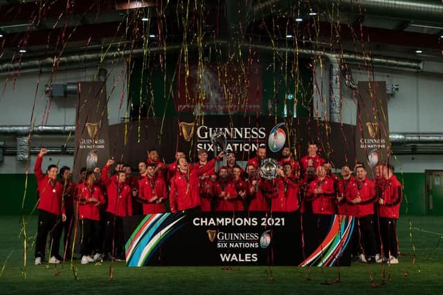 The Wales squad celebrate winning the 2021 Six Nations Championship with the Six Nations Trophy and the Triple Crown on March 27, 2021 in Cardiff, Wales.
(Photo by Ben Evans - Pool/Getty Images)