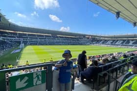 Nine-year-old Ollie Milne pictured at Derby in April. He attended 67 Pompey matches this season.