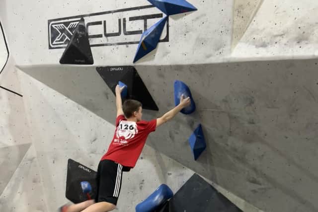 Sam climbing.