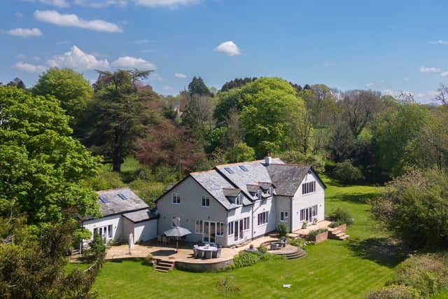 The luxury home sits on an acre of prime Hampshire countryside land