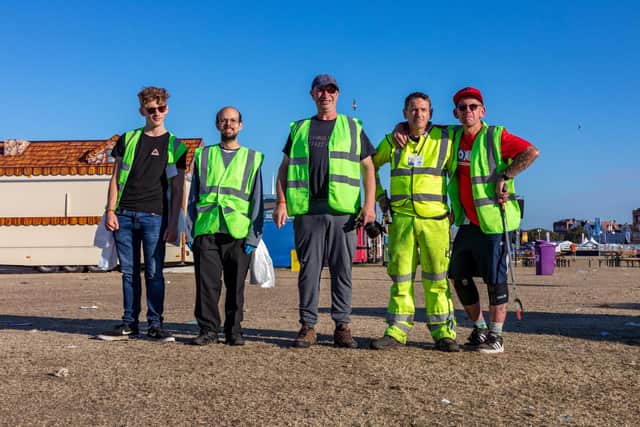 Part of the shift of 35 litter pickers who have been working the site since Sunday night