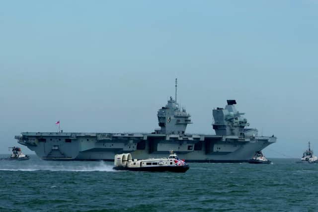 HMS Queen Elizabeth pictured leaving Portsmouth for her training around the British coast.
Picture: Alison Treacher