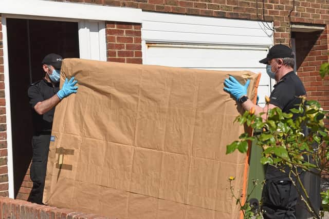 Police remove two mattresses from the property in All Saints Road, Buckland, following the arrest of three women on May 12. Picture: Simon Czapp/Solent News & Photo Agency
