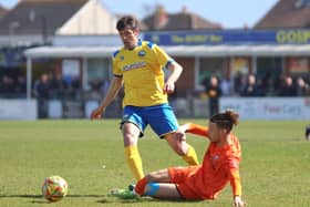 Gosport's Danny Hollands in action against Hartley Wintney. Picture by Tom Phillips