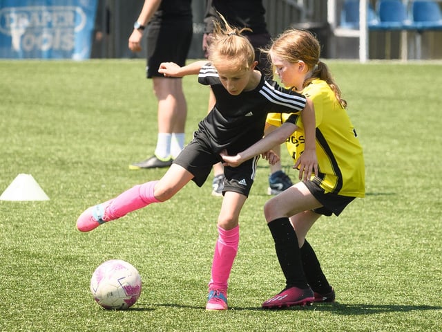 Girls' football action from the Havant & Waterlooville Summer Tournament. Picture: Keith Woodland (030621-58)