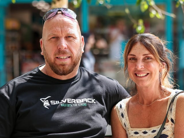 James Masson and Trudy Baker enjoy The Whites Stripes' 'Seven Nation Army 'played by Denmead Brass. Waterlooville Music and Arts Festival took place in the precinct, Waterlooville
Picture: Chris Moorhouse (170824-66)