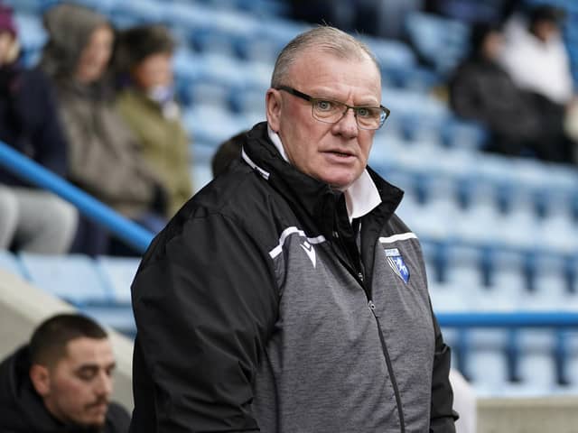 Gillingham manager Steve Evans was the focus of attention from many Pompey fans after his behaviour yesterday.