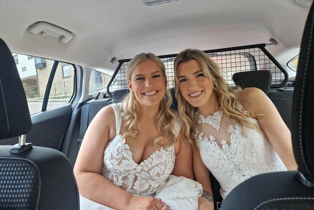 The brides in the police car on their way to the wedding. Picture: Hedge End Police.
