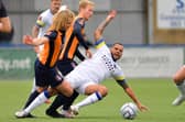 Slough goalscorer Arron Kuhl, left, with Hawks' Billy Clifford. Picture: Martyn White.
