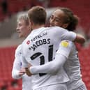 Marcus Harness is congratulated for his opener at Sunderland by Michael Jacobs.  Picture: Daniel Chesterton/phcimages.com
