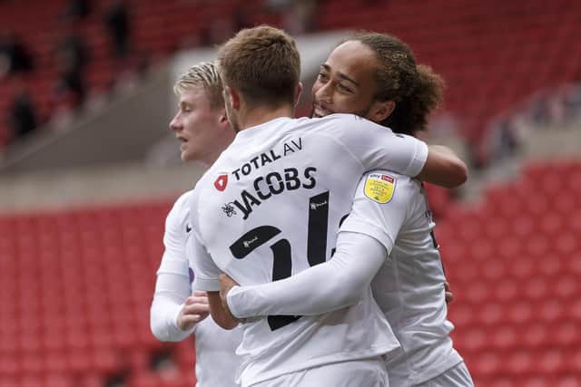 Marcus Harness is congratulated for his opener at Sunderland by Michael Jacobs. Picture: Daniel Chesterton/phcimages.com