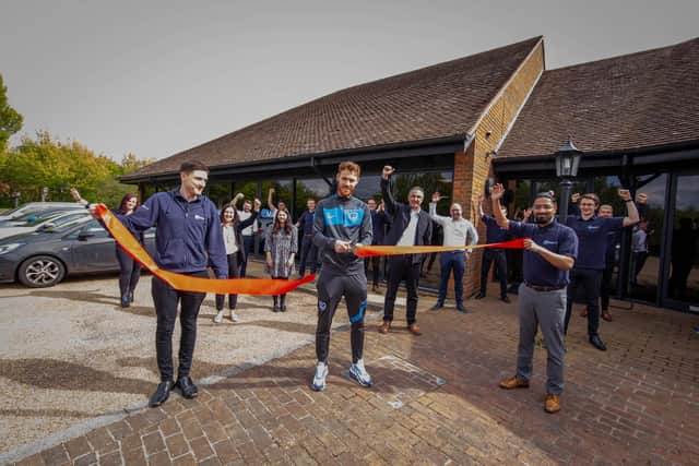 Matrix IT have recently moved to much bigger office and have Pompey player, Tom Naylor to mark the opening

Pictured: Footballer Tom Naylor with the staff in front of the new office in Portchester on 29 April 2021

Picture: Habibur Rahman