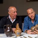 Brothers Julian and Lincoln Barnwell with some of the artefacts from the HMS Gloucester. Picture: UEA/PA Wire