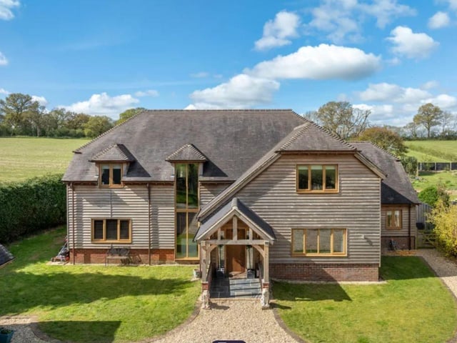 This property comes with five bedrooms, three bathrooms and six reception rooms as well as a swimming pool and huge garden.