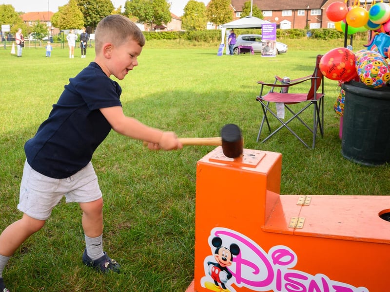 Pictured is: Jenson Hall rings the bell too win a prize.Picture: Keith Woodland (300921-5)