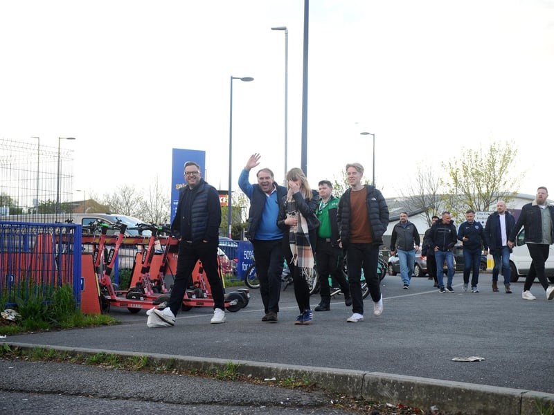 Fans in and out of the ground at Fratton Park as they prepare for the match between Portsmouth FC v Barnsley Picture: Sarah Standing (160424-7359)