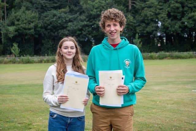Pictured left to right: Deputy Head Girl, Ramona and Head Boy, Oliver celebrating their results.